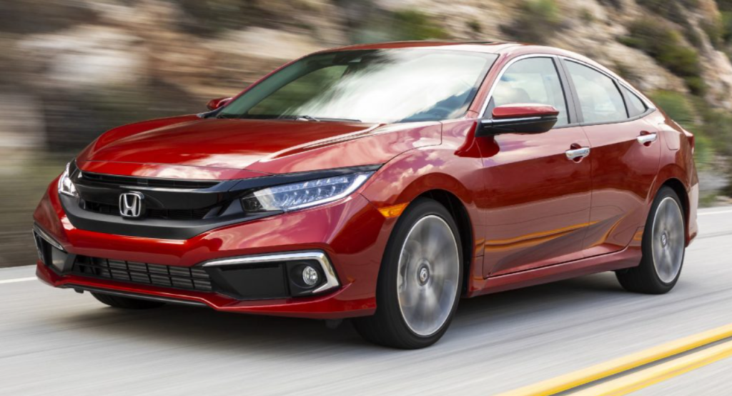 Passenger angle of a red 2020 Honda Civic Coupe