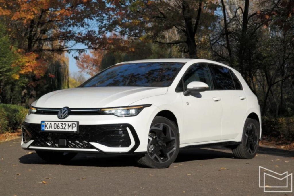 Driver angle of a white 2020 Volkswagen Golf driving on a road