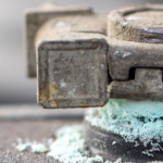 How to Safely Clean Corrosion Off a Car Battery Terminal